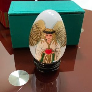 Beautiful hand-painted glass egg with stand